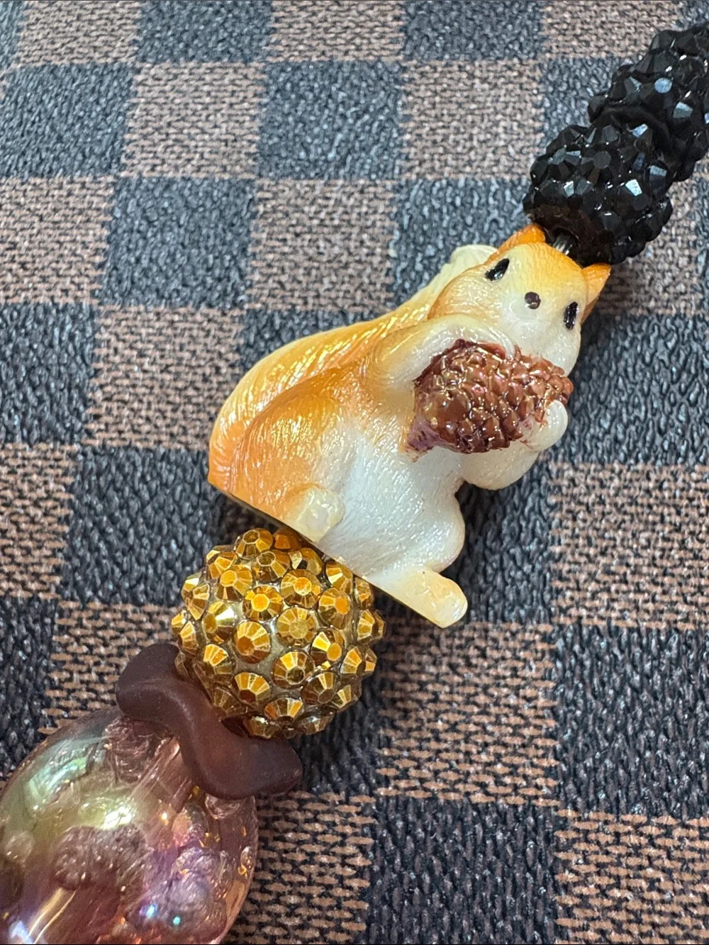 Handcrafted Black Beaded Pen with Orange Squirrel Accent
